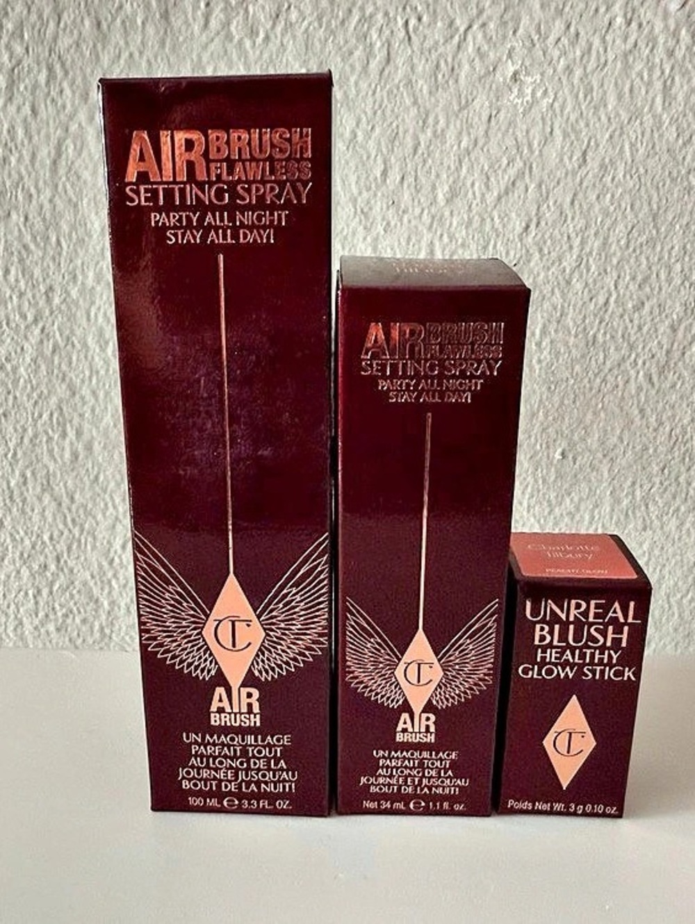 Charlotte Tilbury Airbrush Flawless Setting Spray and Unreal Blush Glow Stick
